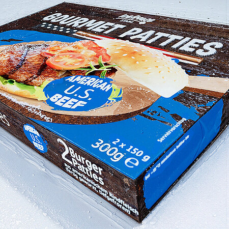 Eine Packung Tiefkühl-Burger Patties von Icehouse. 